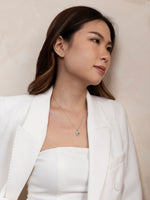 Load image into Gallery viewer, Emerald Oval Halo Platinum Earrings