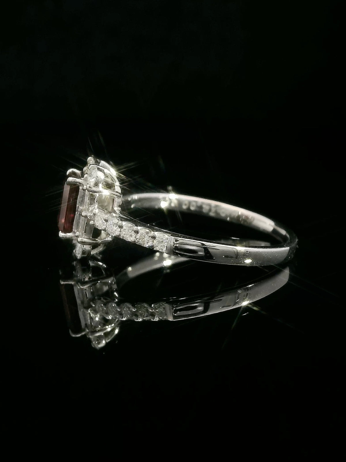 Ruby halo ring   platinum