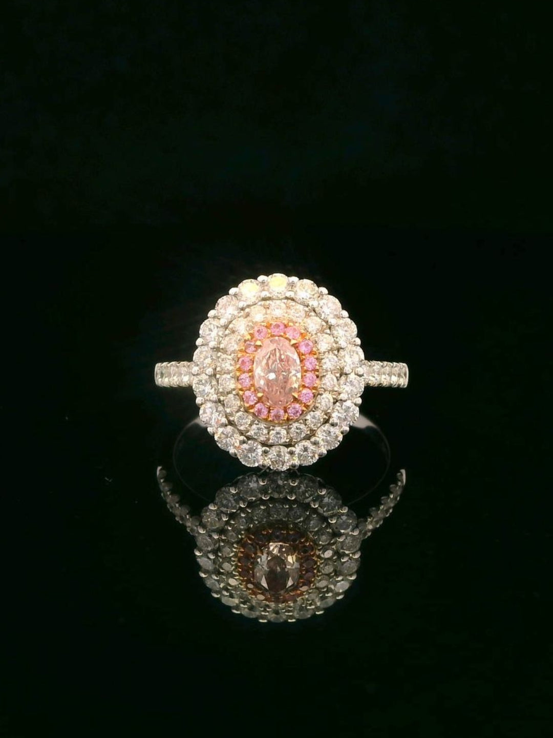 Double Halo Oval Pink Diamond Ring