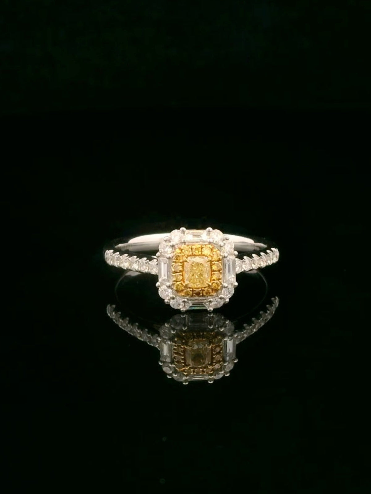Yellow diamond ring   18k white gold